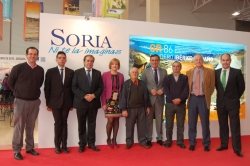 VARIOS ALCALDES DE LA PROVINCIA, EL PRESIDENTE DE LA DIPUTACIÓN Y DIPUTADOS PROVINCIALES EN EL STAND DE SORIA EN INTUR